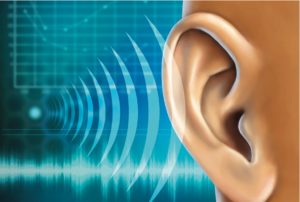 Tinnitus illustrated by a graphic showing sound waves reaching an ear.
