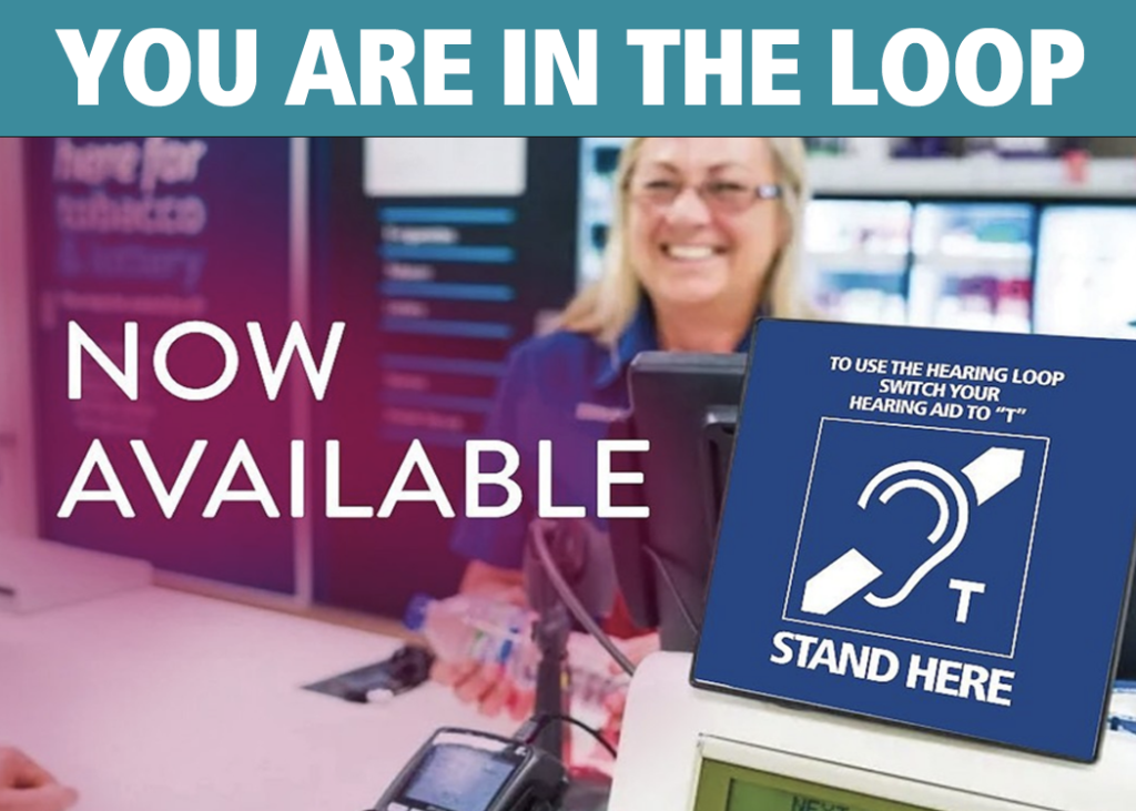 Hear The North graphic - a woman assists a customer at a counter with a hearing loop sign.